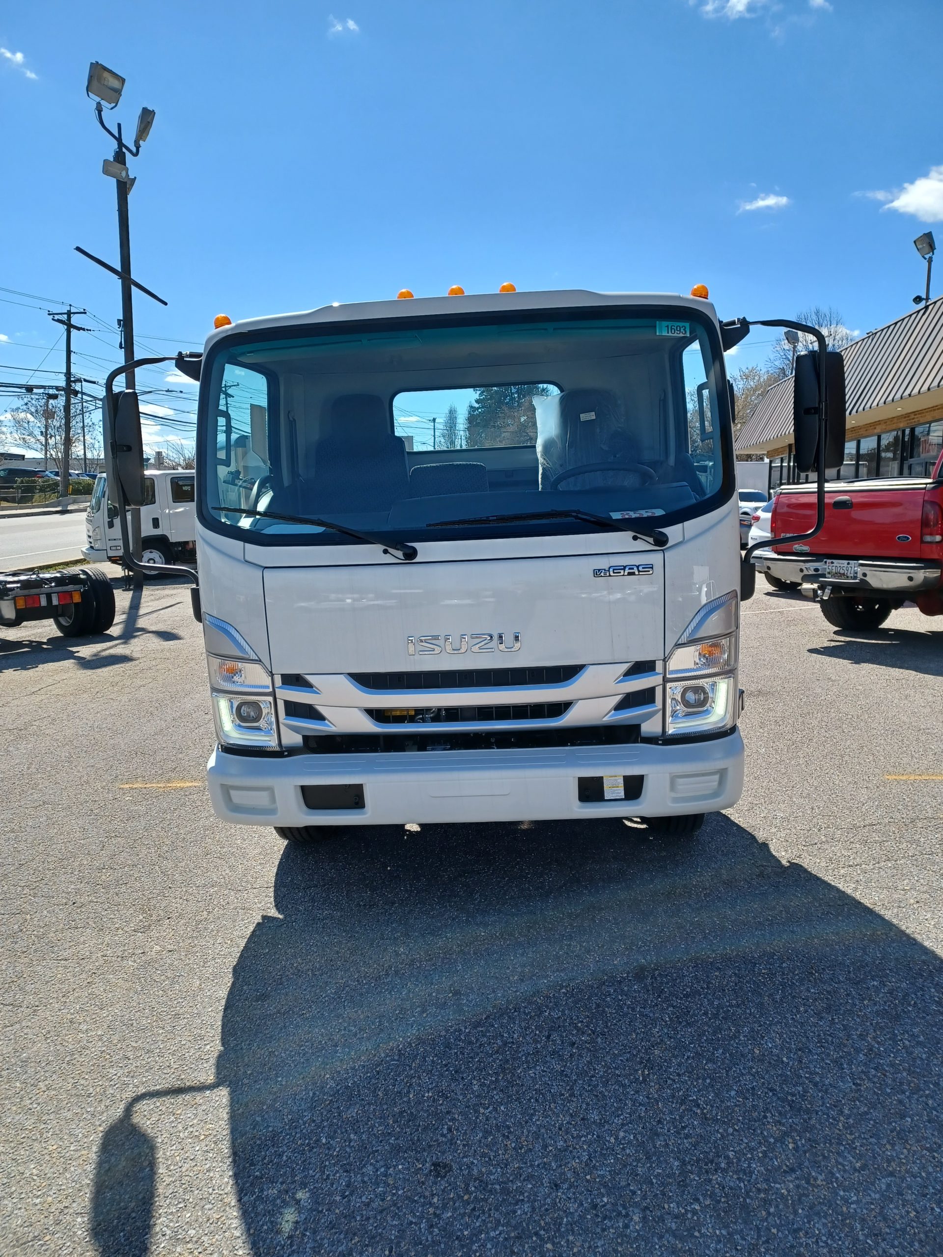 New 2024 Isuzu NPR-HD Crew Cab 4x2, Cab Chassis for sale #2036 - photo 1